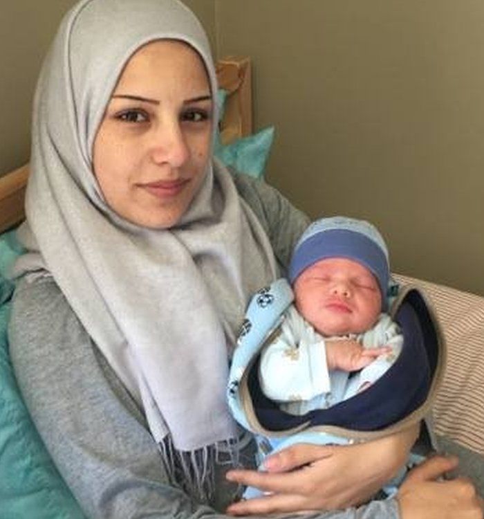Afraa Bilan holding baby Justin Trudeau - May 6 2017