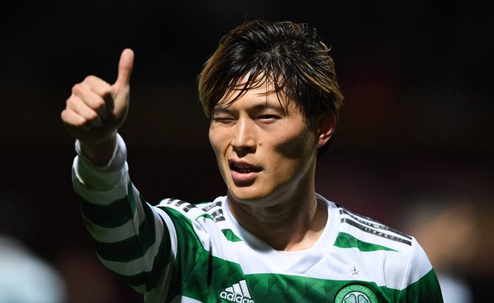 Celtic star Kyogo Furuhashi seems impressed as journalist brings