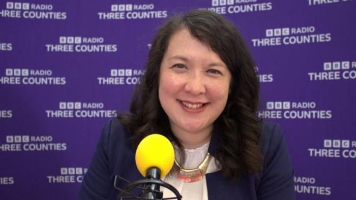 Victoria Collins in the BBC Three Counties Radio studio