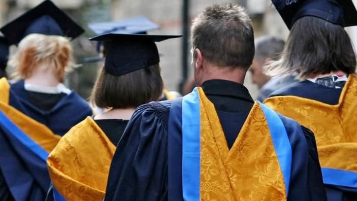 People wearing academic gowns