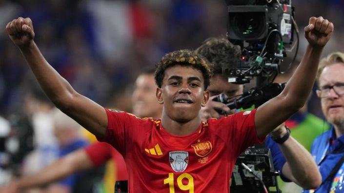 Lamine Yamal celebrates Spain's win against France