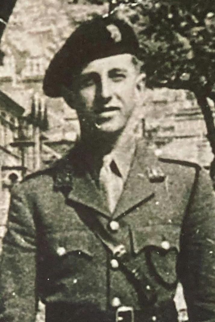 Old black and white photo of Frederic Newton in his uniform during the war