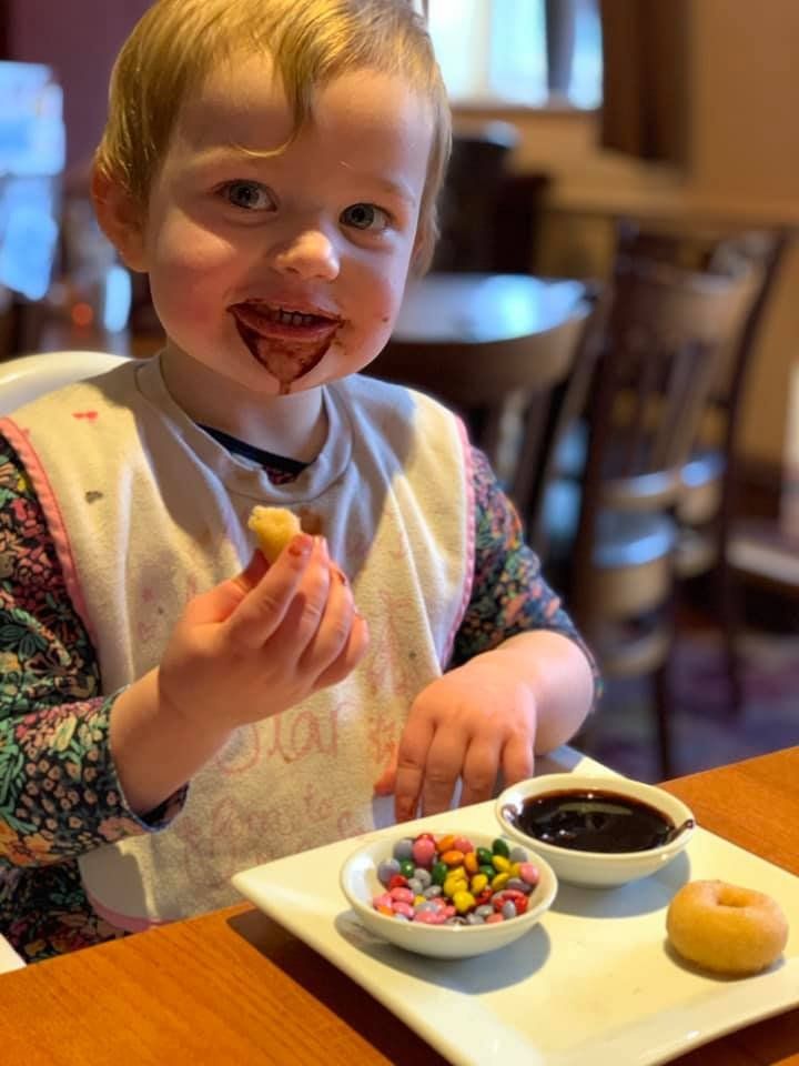 Child making a mess at a restaurant