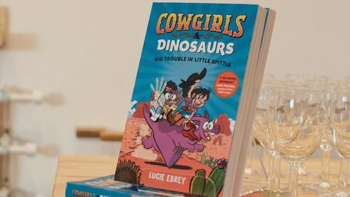 A copy of Cowgirls and Dinosaurs
