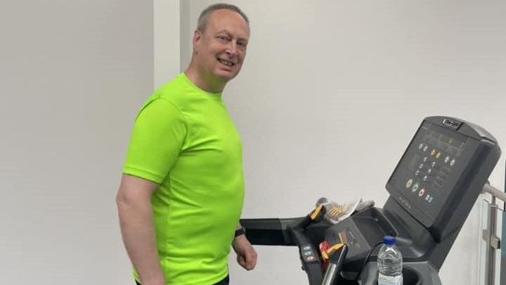 Canon Gavin Kibble MBE on a treadmill 