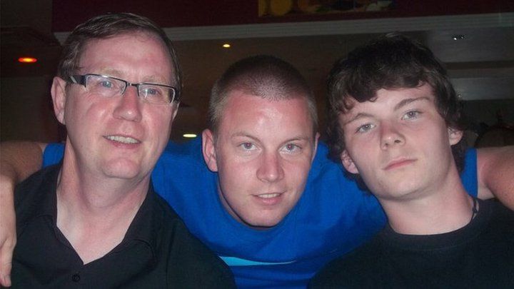 Ryan Myers (centre) with his dad and brother