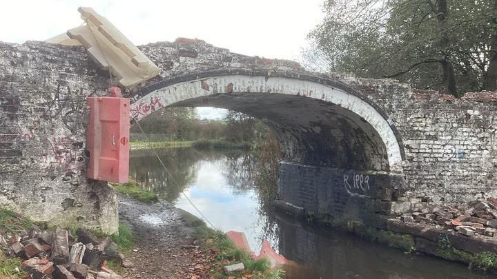 The damaged canal bridge