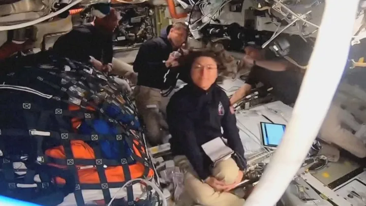 Artemis II spacecraft soaring against the backdrop of deep space, illustrating the mission’s record‑breaking trajectory.