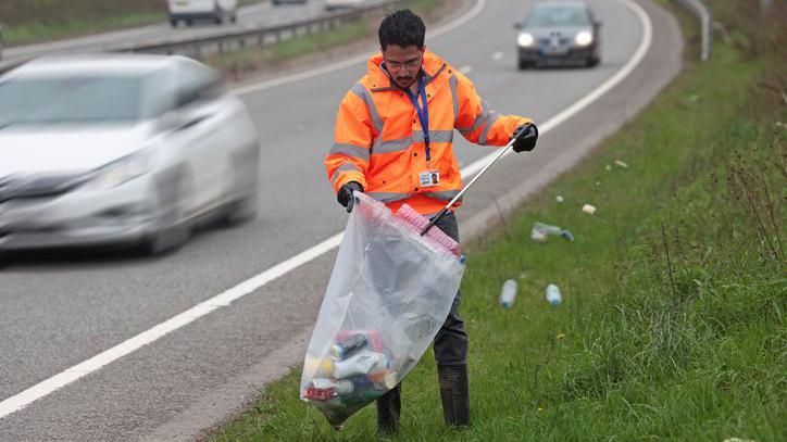Highways worker litter picking