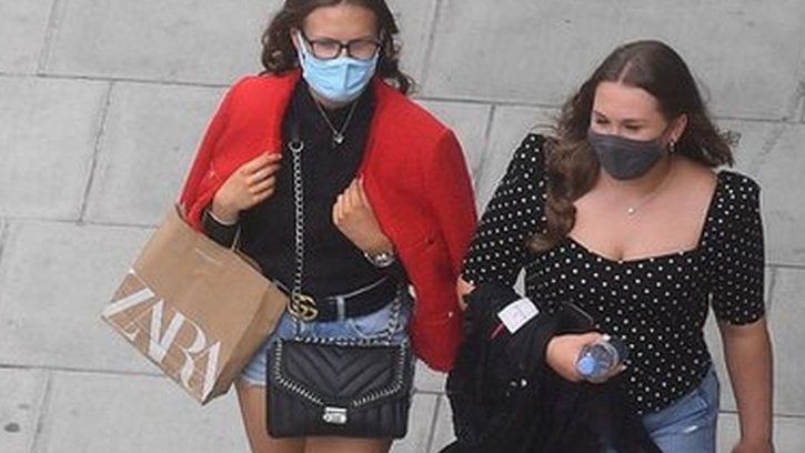 Shoppers in face masks on Oxford Street