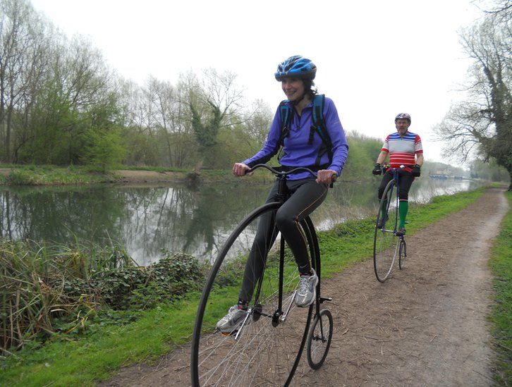 Penny farthing cyclists