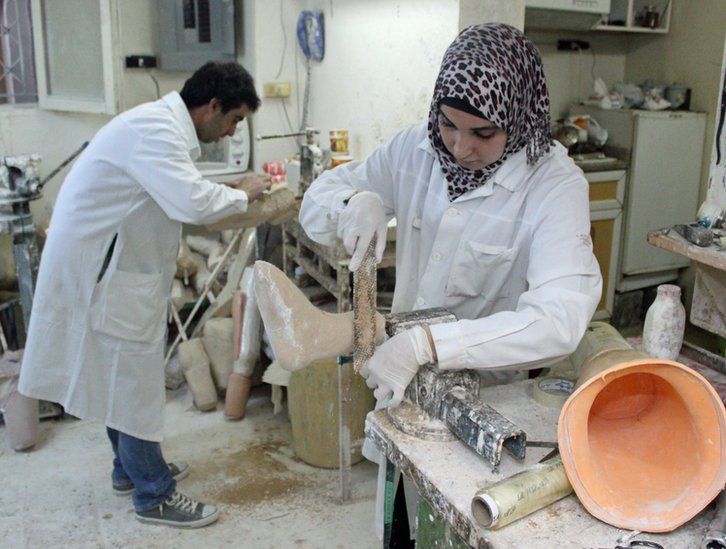 A workshop in Amman constructs artificial limbs