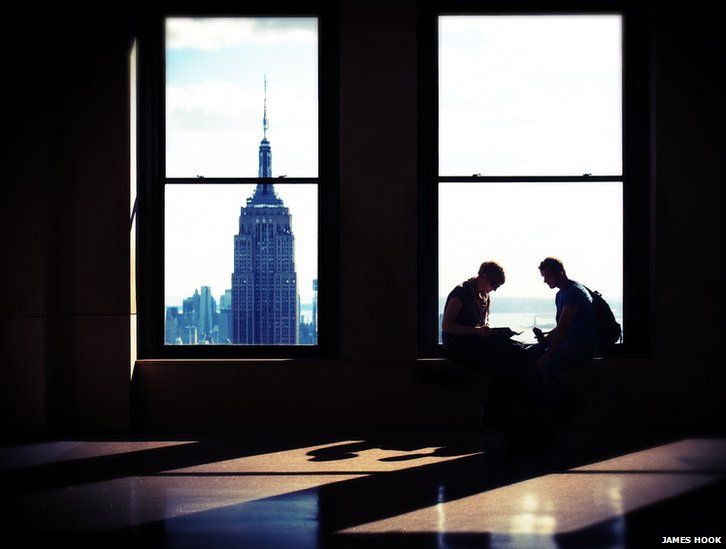 Couple in a window in New York