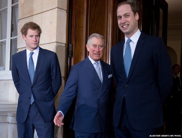 Britain's Prince Charles (centre) with his sons Prince William (right) and Prince Harry pose for the media outside Lancaster House