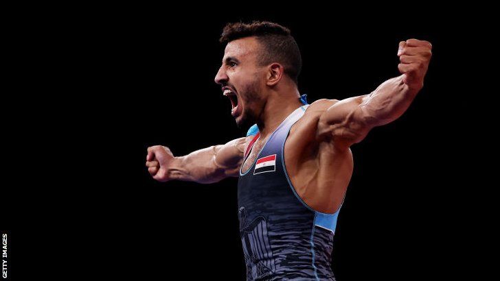 Egypt's Mohamed Ibrahim Elsayed Elsayed celebrates winning Olympic bronze in Greco-Roman wrestling