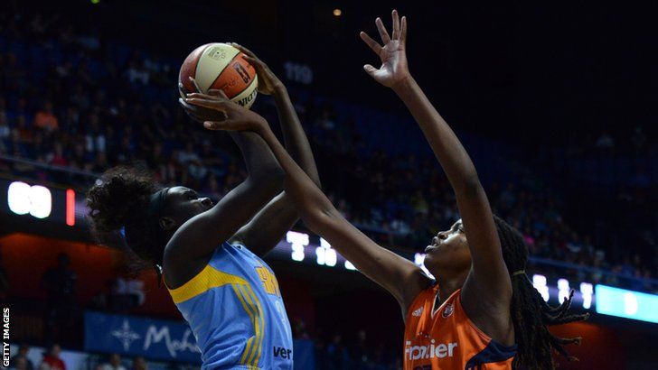 South Sudan-born Adut Bulgak (left) jumps with the ball while playing for WNBA side Chicago Sky against Connecticut Sun's Jonquel Jones in 2016
