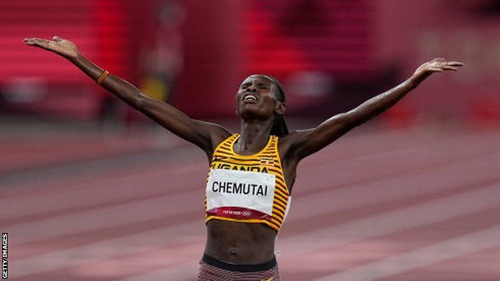 Uganda's Peruth Chemutai celebrates winning the 3,000m steeplechase gold at the Tokyo Olympics