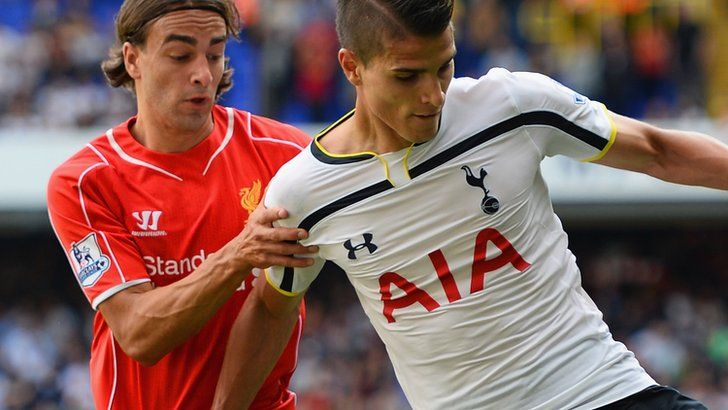 Tottenham's Erik Lamela holds off Liverpool's Lazar Markovic