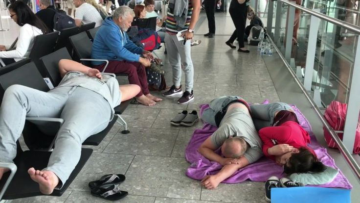 People sleeping in Heathrow Airport