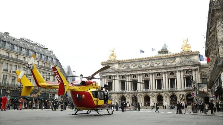 An emergency medical helicopter waits at place de l'Opéra after an explosion at a bakery in nearby Rue de Trévise in Paris, France, on 12 January 2019