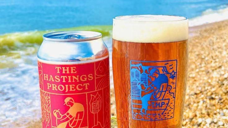 The Hastings Project pint of beer and can 