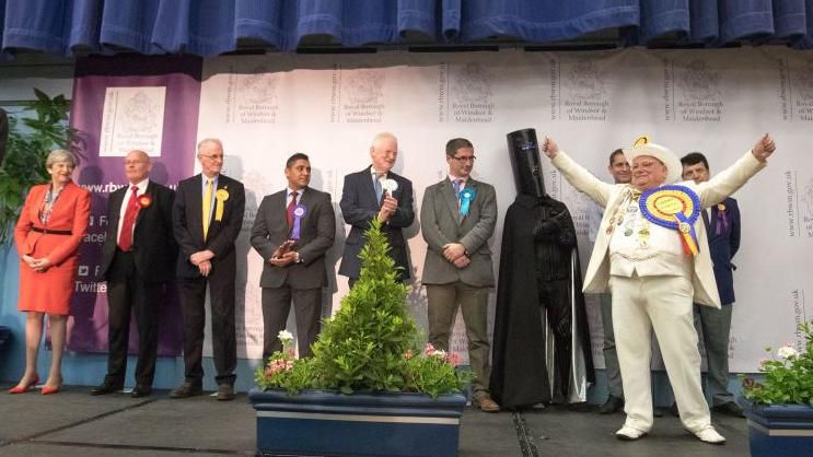 British Prime Minister and Conservative Party leader Theresa May (far left) stands with other candidates at the declaration at the election count at the Magnet Leisure Centre during the 2017 general election