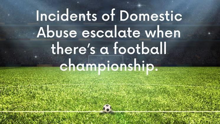 A CGI image of a football stadium with green grass and a football on the halfway line with writing that says: "Incidents of domestic abuse escalate when there's a football championship".