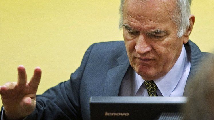 Former Bosnian Serb General Ratko Mladic at his trial at the UN Yugoslav war crimes tribunal in The Hague on 16 May 2012
