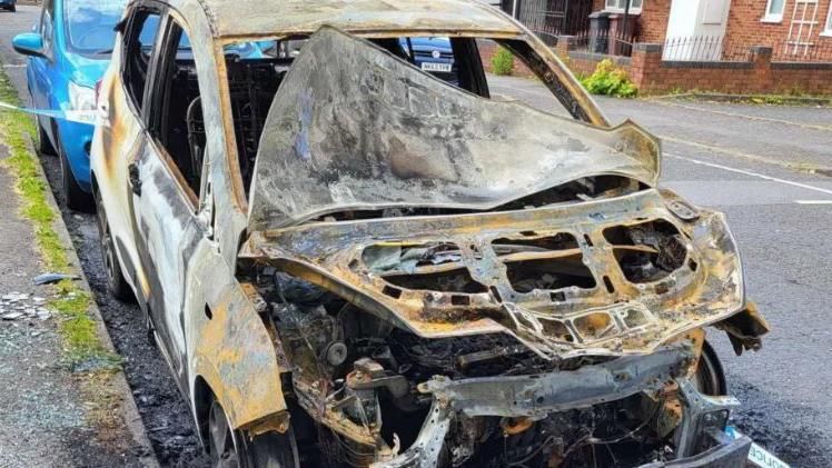 A burnt out car in Wolverhampton