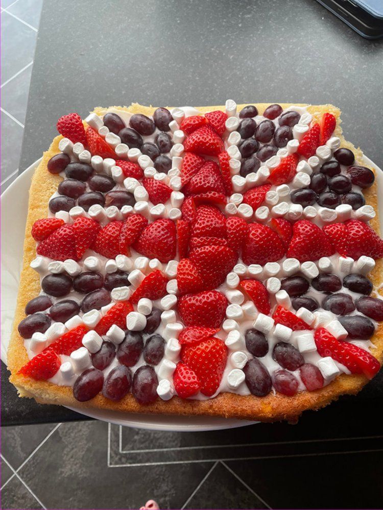 A cake with the union flag on top