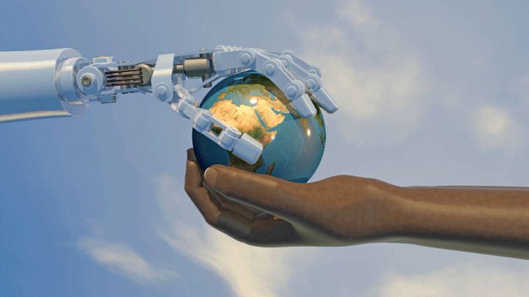 Robot and human hand on globe