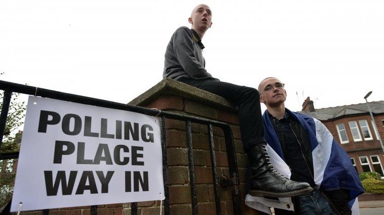 Young people outside polling station