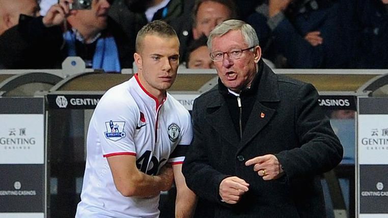 Tom Cleverley on the touchline with Sir Alex Ferguson