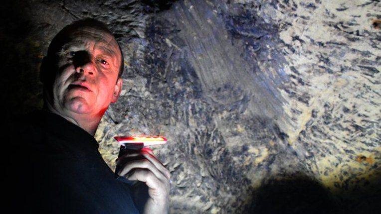 Paul O'Shea in his cave
