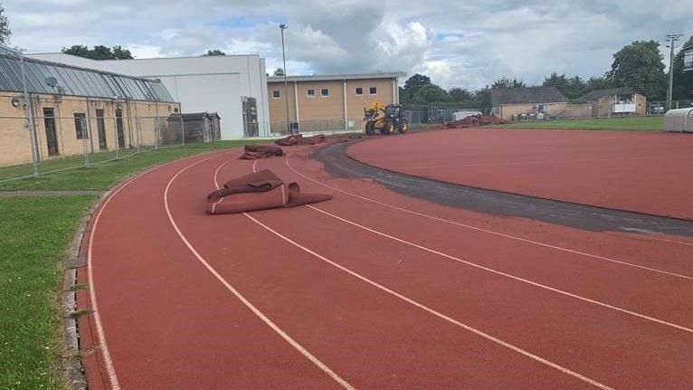 Differs on the red running track removing lanes. One lane has been removed.