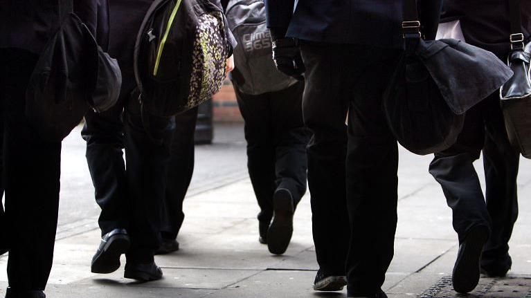 Schools pupils with bags