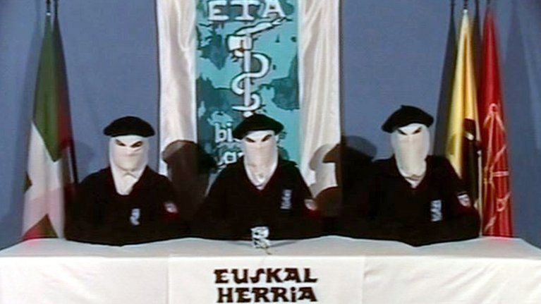 Masked Eta members speak in a televised message (file image)