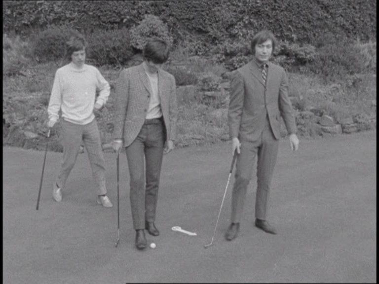 The Rolling Stones playing golf 
