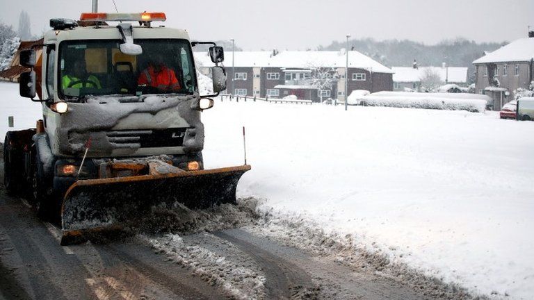 A snow plough working to clear roads in Ironbridge, in Shropshire