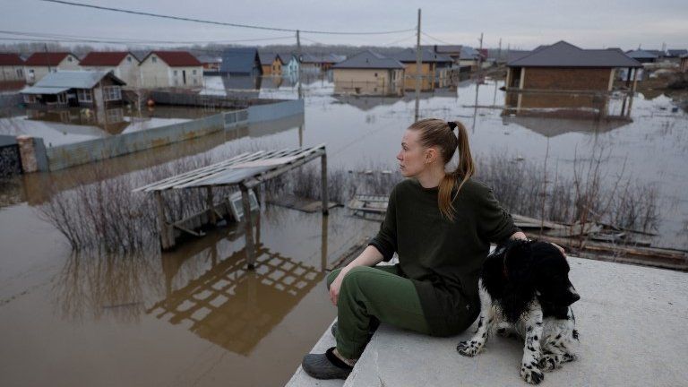 Local resident with dog in Ivanovskoye, Orenburg region