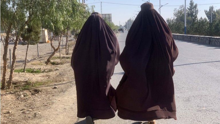 Female students leave the Kandahar university in Kandahar, Afghanistan, 21 December 2022.