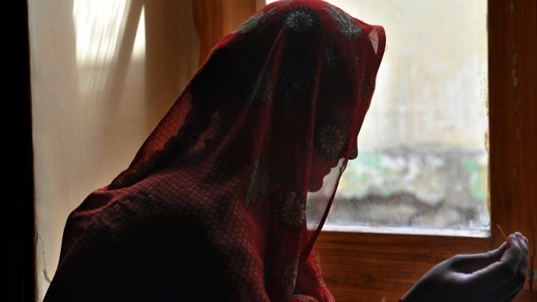 file photo of Afghan woman at a shelter for women