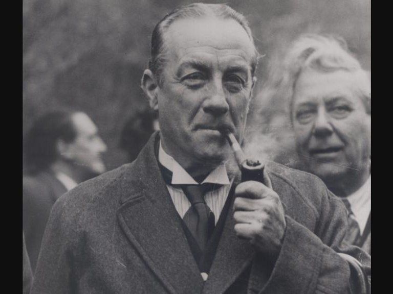 Picture of Stanley Baldwin smoking a pipe
