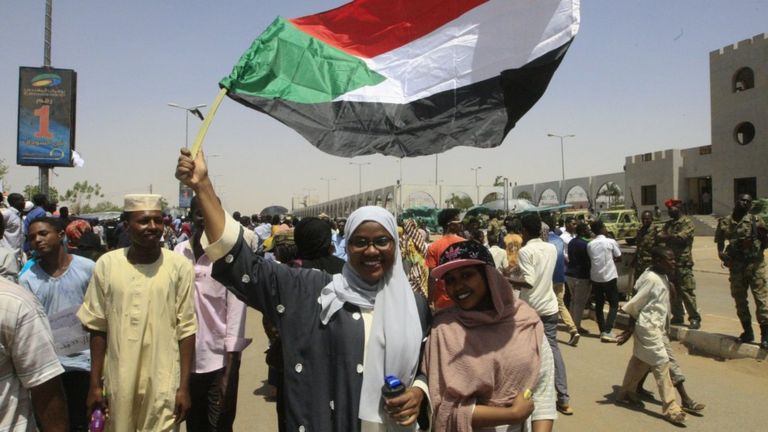 Demonstrators in Khartoum near the military headquarters, 13 April 2019