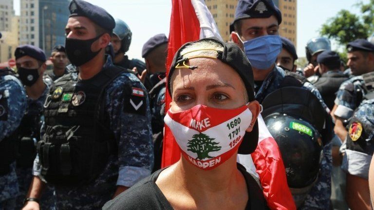 Woman wearing a face mask at an anti-government protest in Beirut (12/08/20)