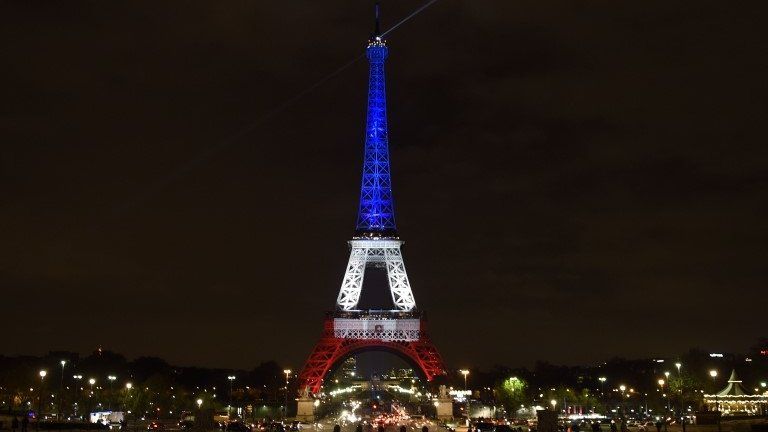 Eiffel Tower, lit in the colours of the French flag, 16 November 2015