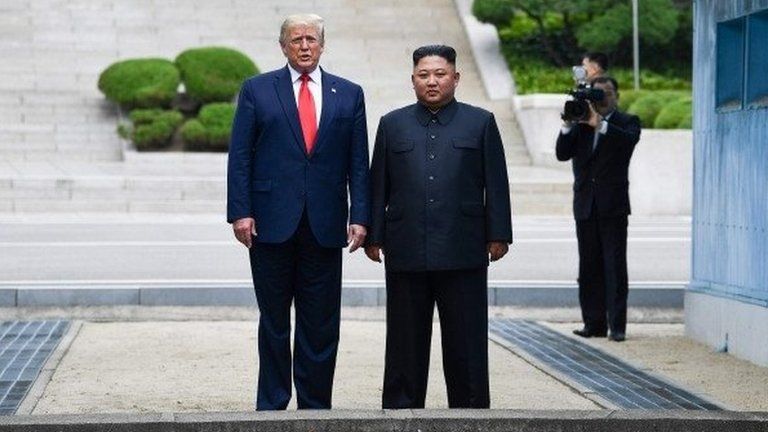 Trump and Kim in North Korea