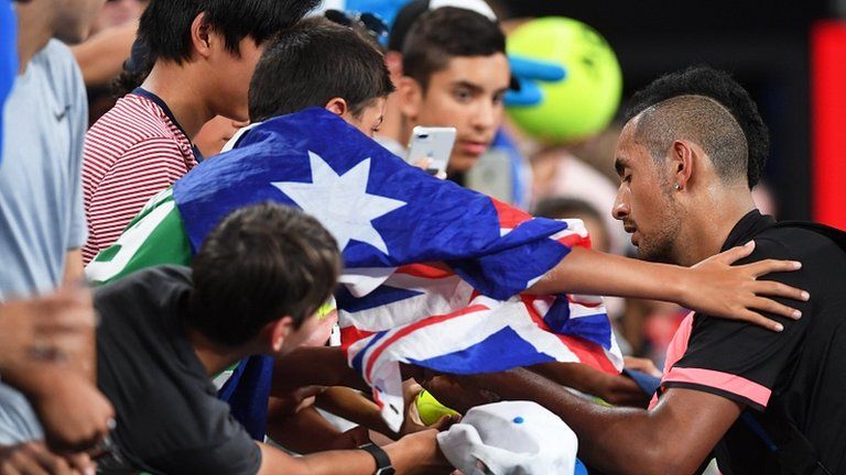 Nick Kyrgios signs autographs for the fans