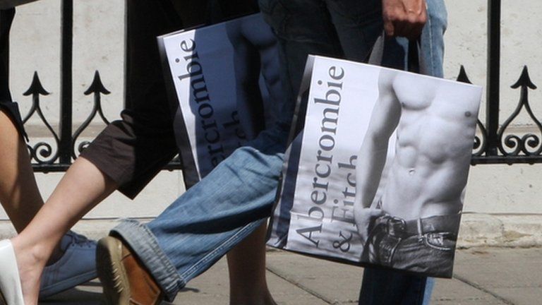 Shoppers leaving Abercrombie & Fitch's flagship shop in London