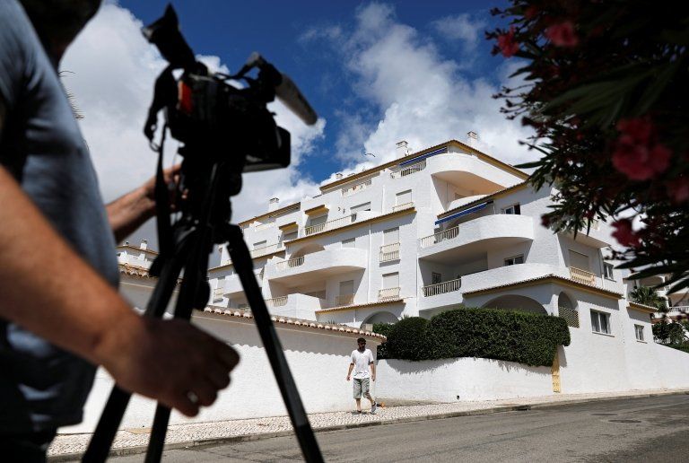 A cameraman films the apartment where three-year-old Madeleine McCann disappeared in 2007, in Praia da Luz, Portugal, 4 June, 2020